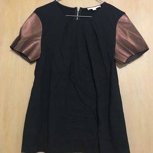 Erin Featherson blouse with vegan leather sleeves